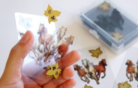 Transparent playing cards for board games with custom printed design